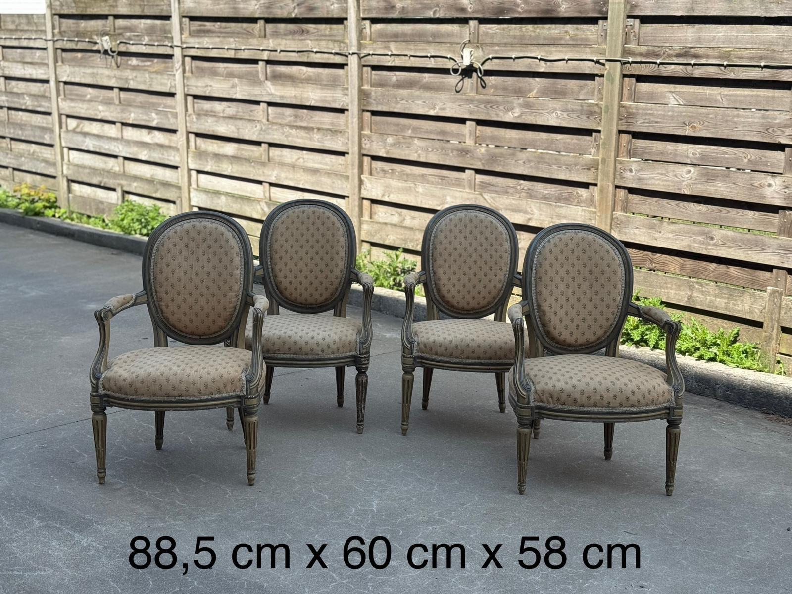 Set of four painted armchairs 