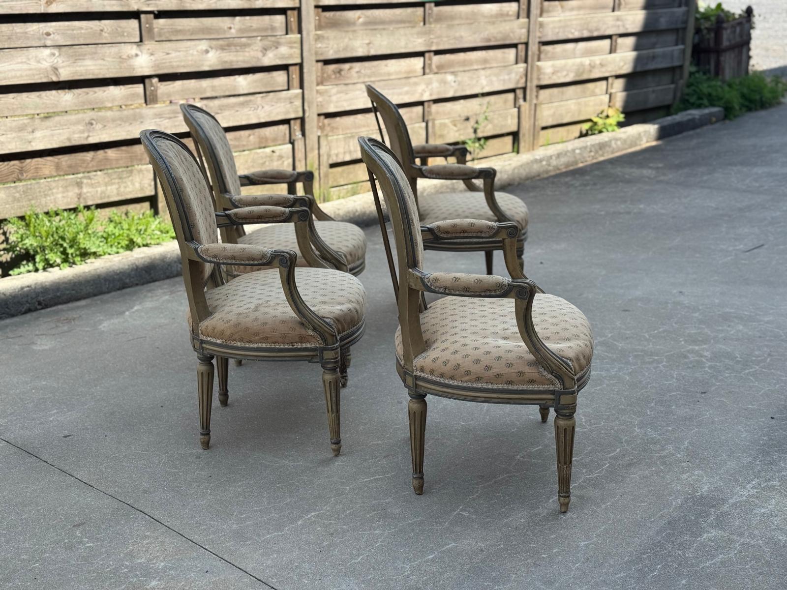 Set of four painted armchairs 