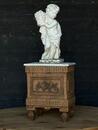 18th century Piédestal and garden putti