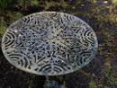 Ancienne table de jardin en fonte