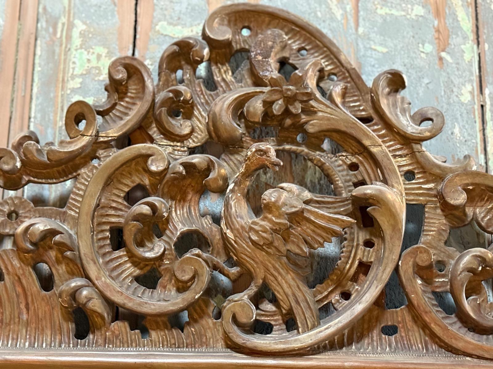 Antique carved wood mirror 