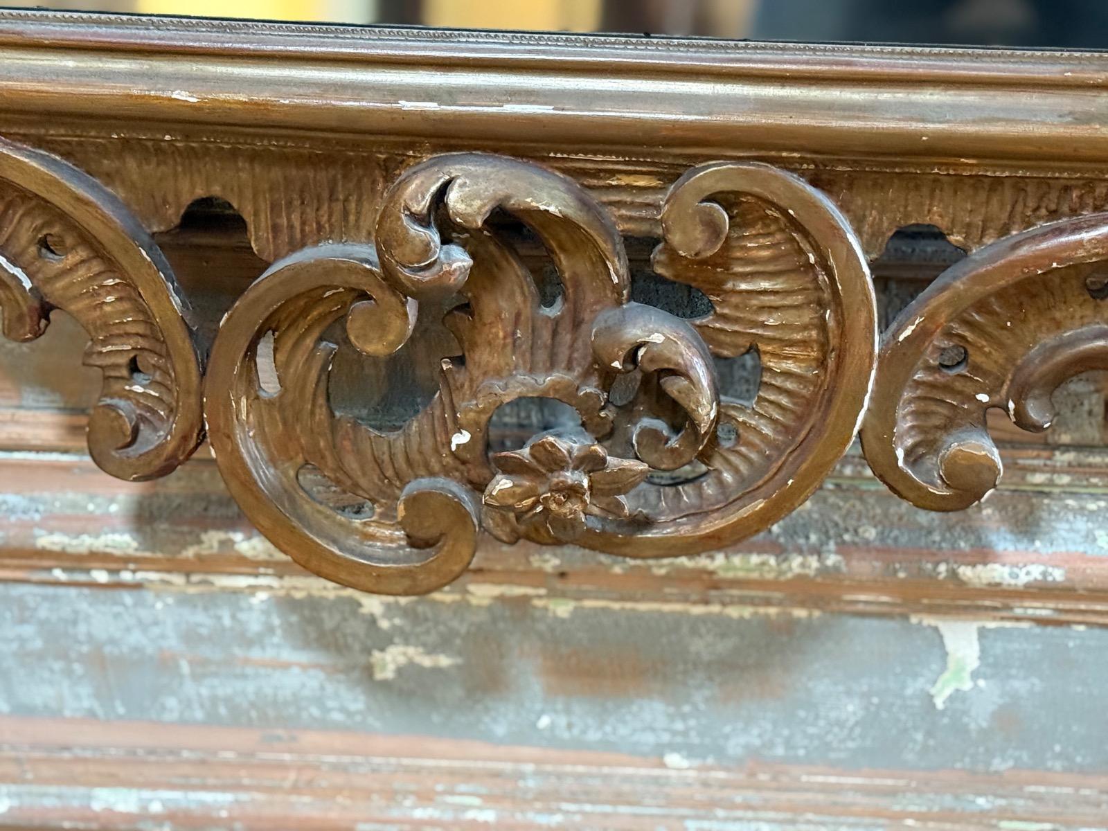 Antique carved wood mirror 