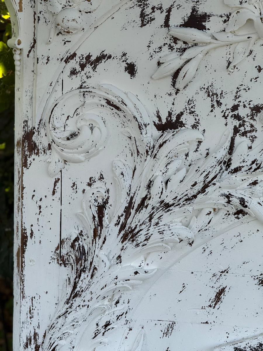 Antique painted and carved decorative panel