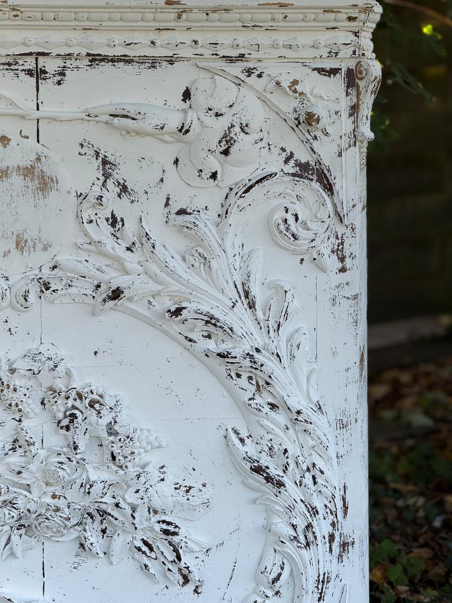 Antique painted and carved decorative panel