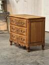 Bleached oak serpentine chest of drawers 