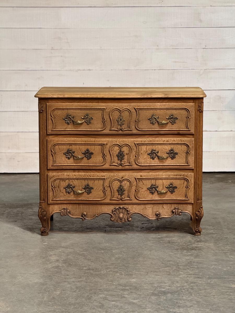 Bleached oak serpentine chest of drawers 