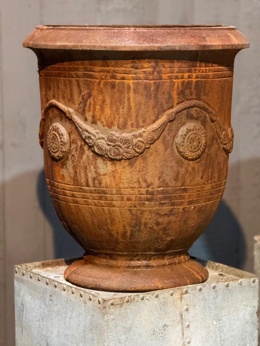 Four cast iron Anduse vases 