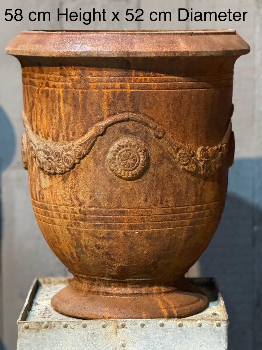 Four cast iron Anduse vases 