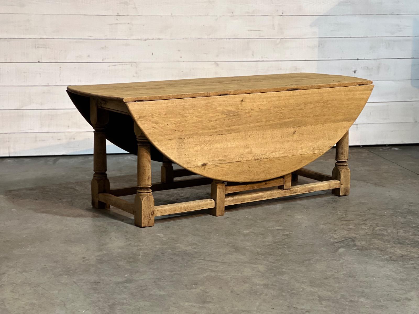 Large bleached oak oval dining table 