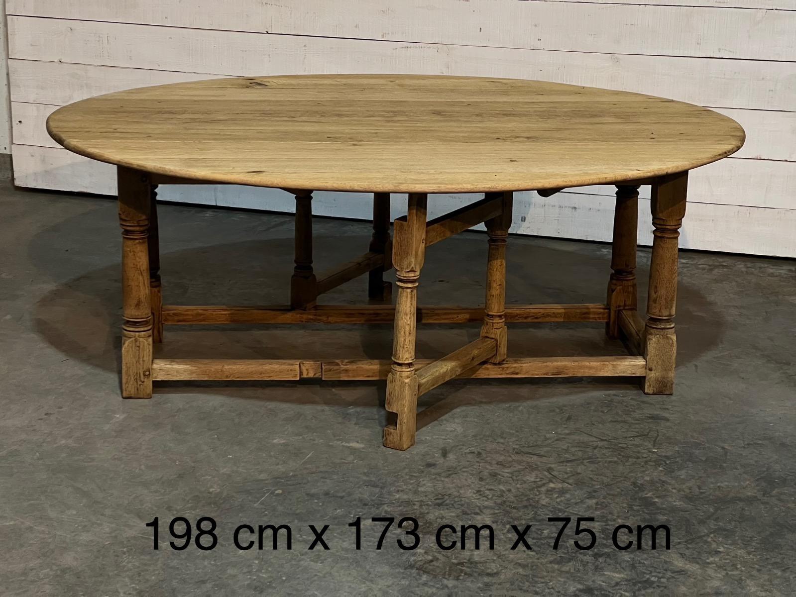 Large bleached oak oval dining table 