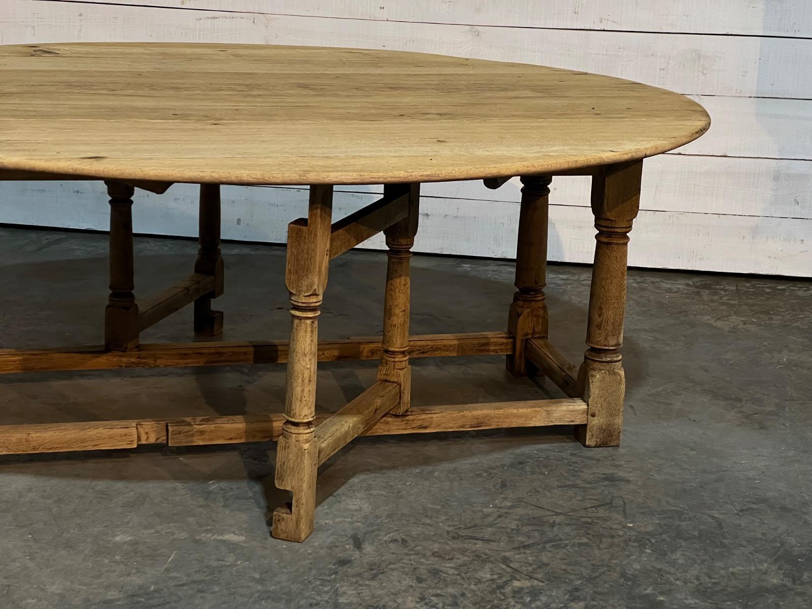 Large bleached oak oval dining table 