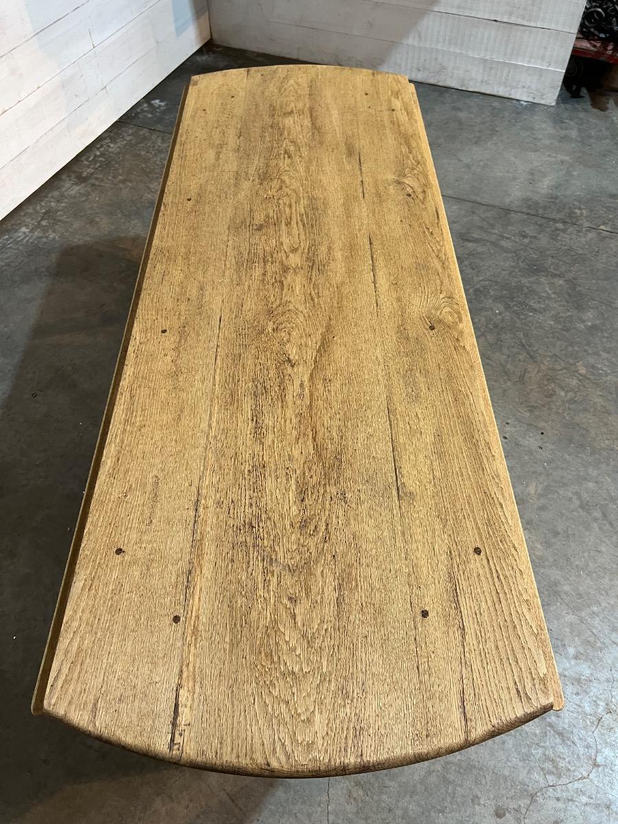 Large bleached oak oval dining table 