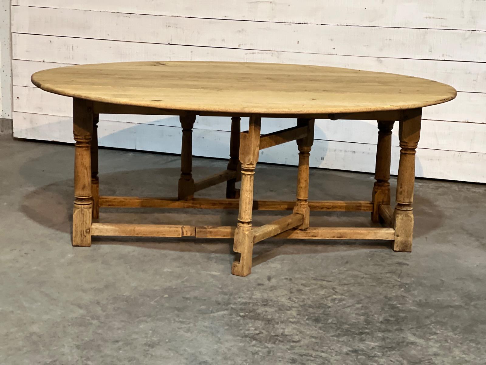 Large bleached oak oval dining table 