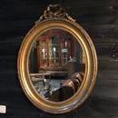 Large miroir oval doré LXVI 19ème siècle