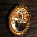 Large miroir oval doré LXVI 19ème siècle