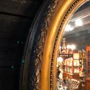 Large miroir oval doré LXVI 19ème siècle