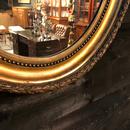 Large miroir oval doré LXVI 19ème siècle