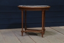 Louis XVI style Oval table with marble top 1900