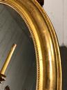 Miroir doré oval