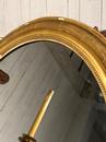 Miroir doré oval