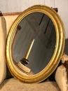 Miroir doré oval