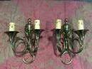 Pair d'appliques en laiton en forme de corps de chasse