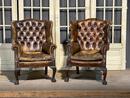 Pair of english leather library armchairs 