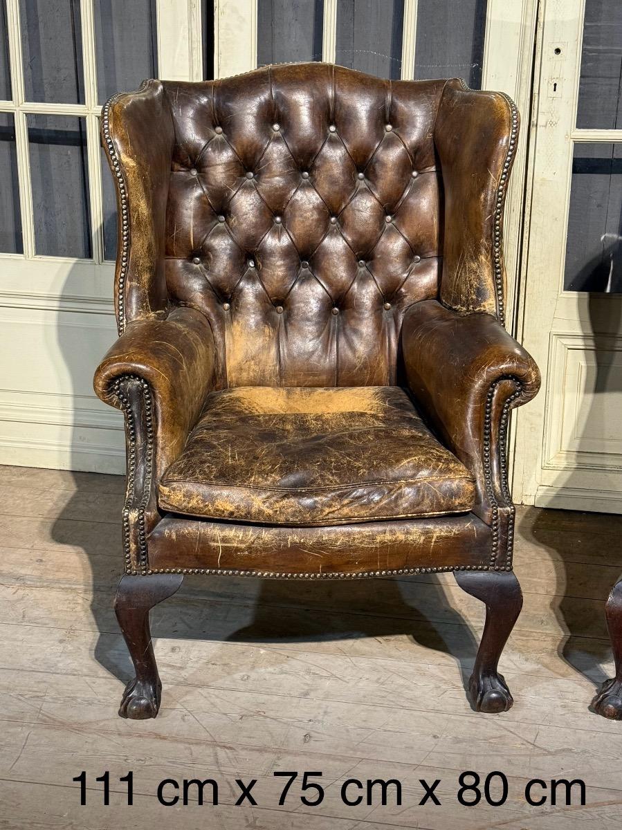 Pair of english leather library armchairs 