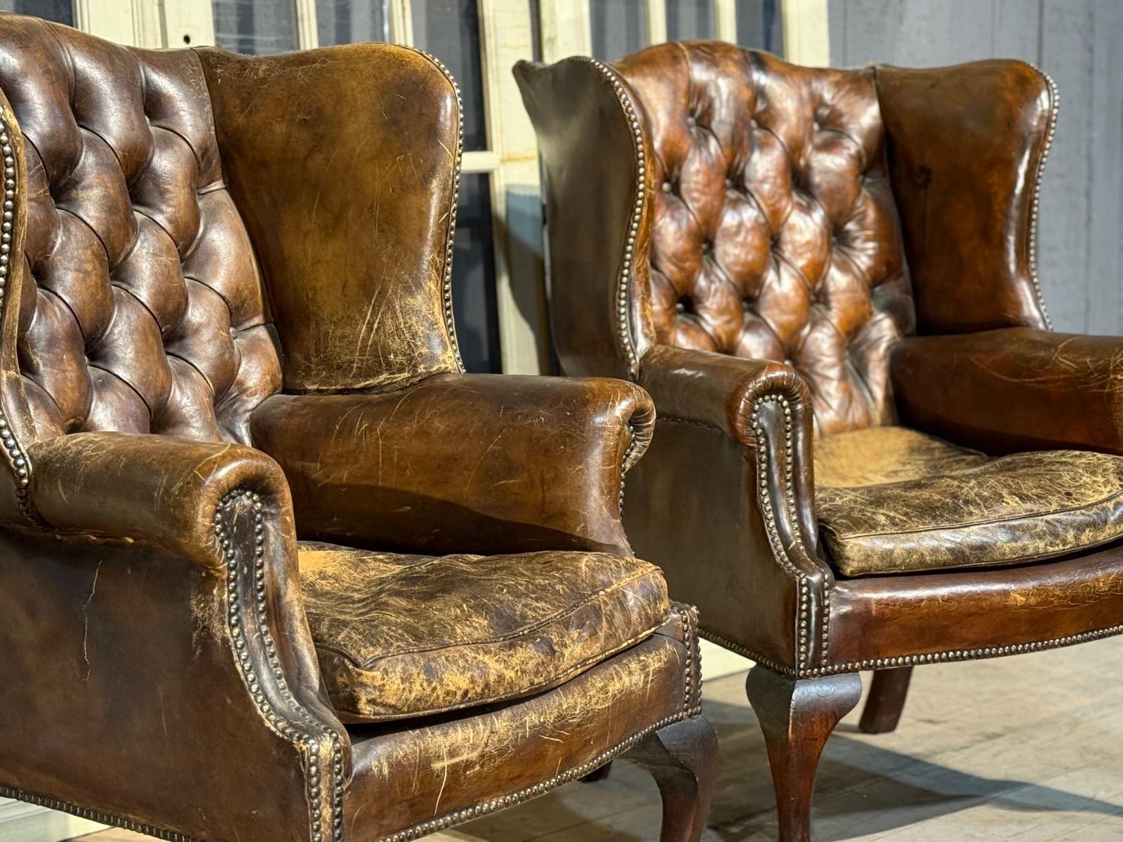 Pair of english leather library armchairs 