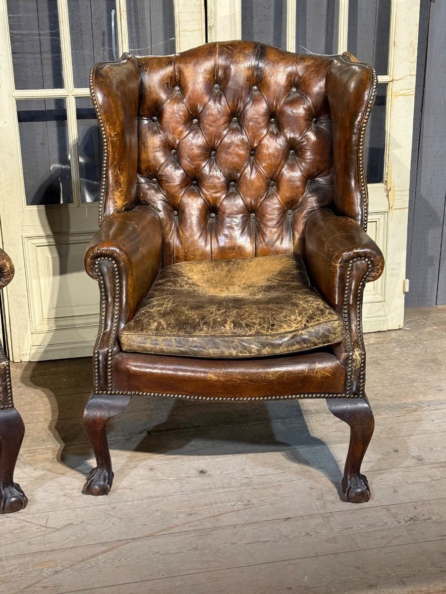 Pair of english leather library armchairs 