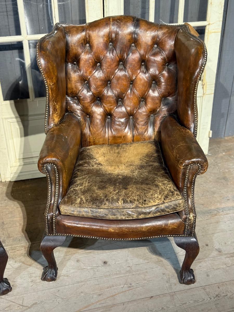 Pair of english leather library armchairs 