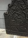 Plaque en fonte de cheminée