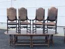Série de 4 fauteuils en cuir et têtes de bélier