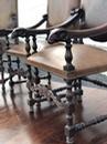 Série de 4 fauteuils en cuir et têtes de bélier