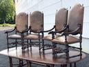 Série de 4 fauteuils en cuir et têtes de bélier