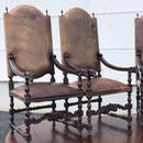 Série de 4 fauteuils en cuir et têtes de bélier