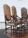 Série de 4 fauteuils en cuir et têtes de bélier