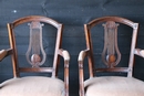 Série de fauteuils en orme du milieu du 19 ème avec dossier en forme de lyre