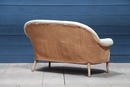 Vintage settee with curved legs, France