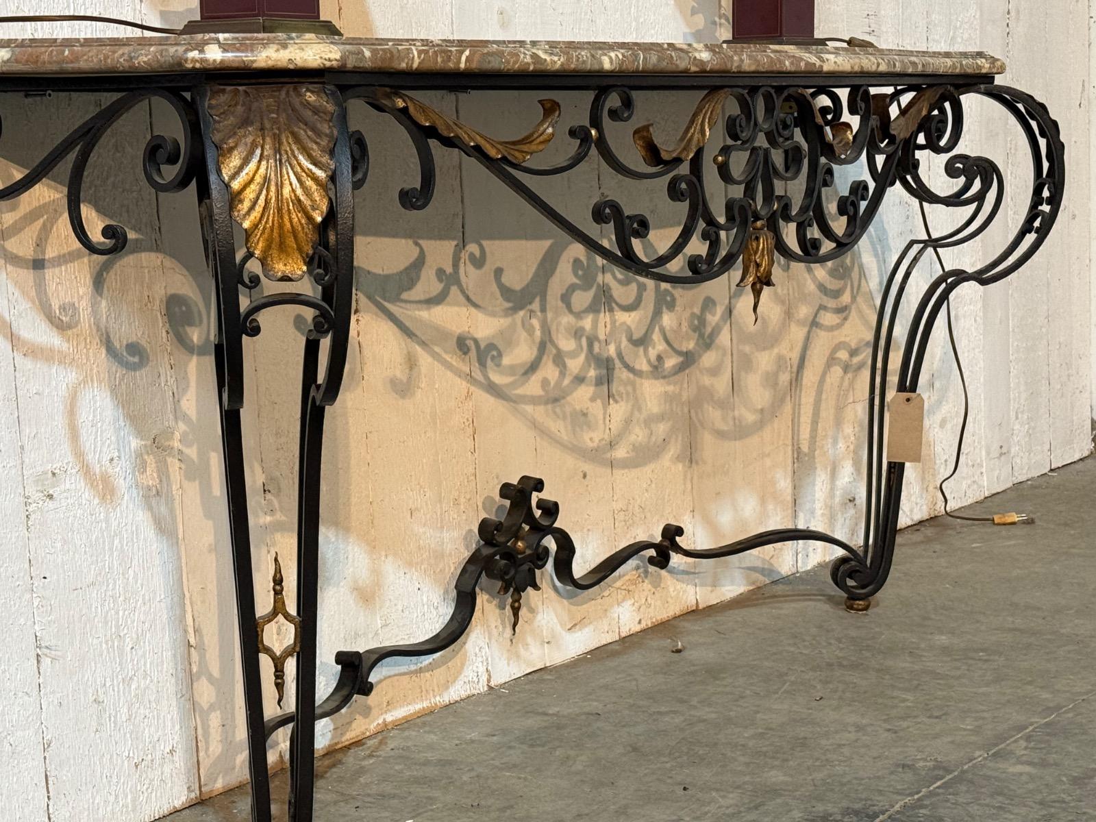 Wrought iron console with a marble top 