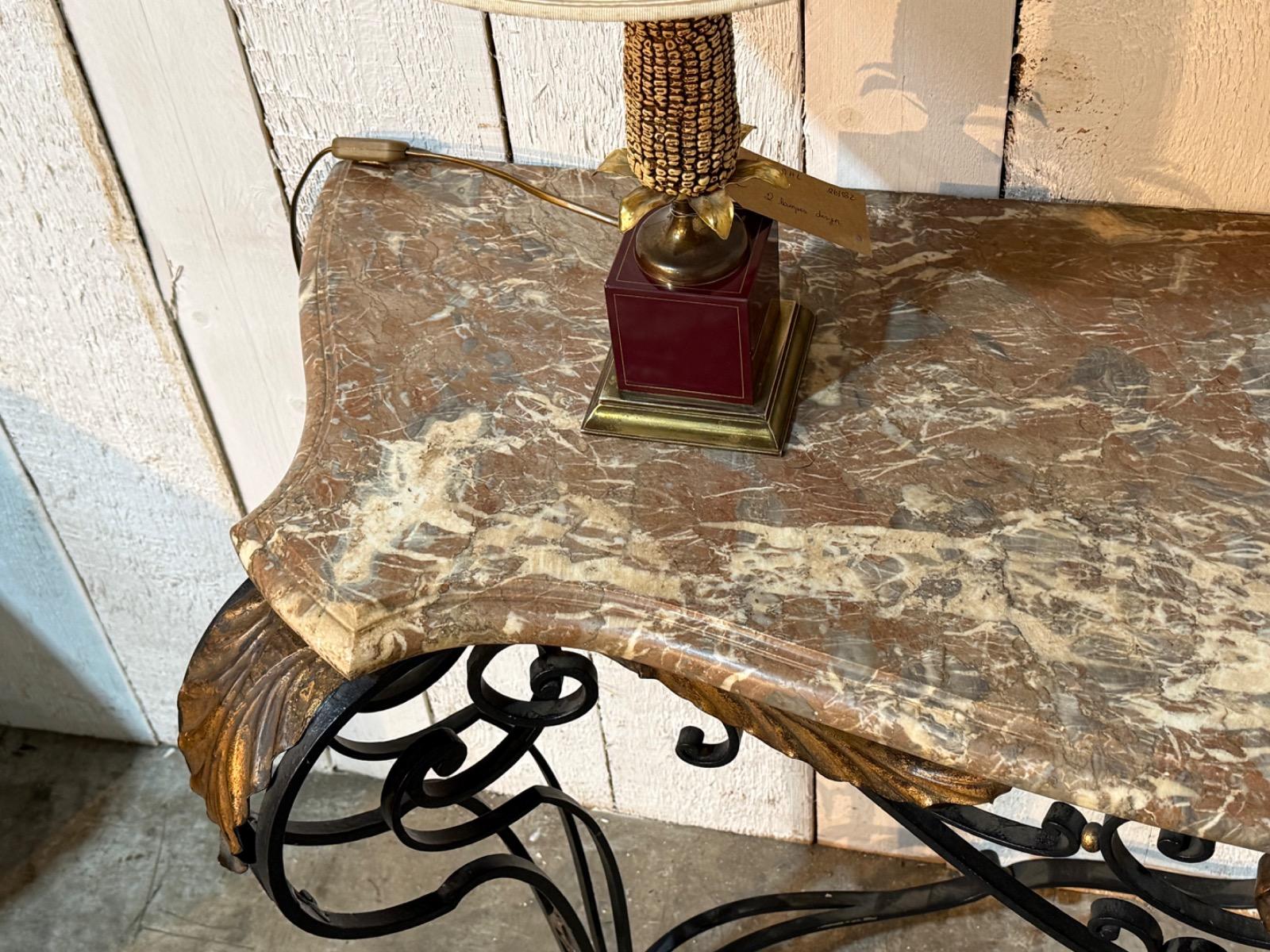 Wrought iron console with a marble top 