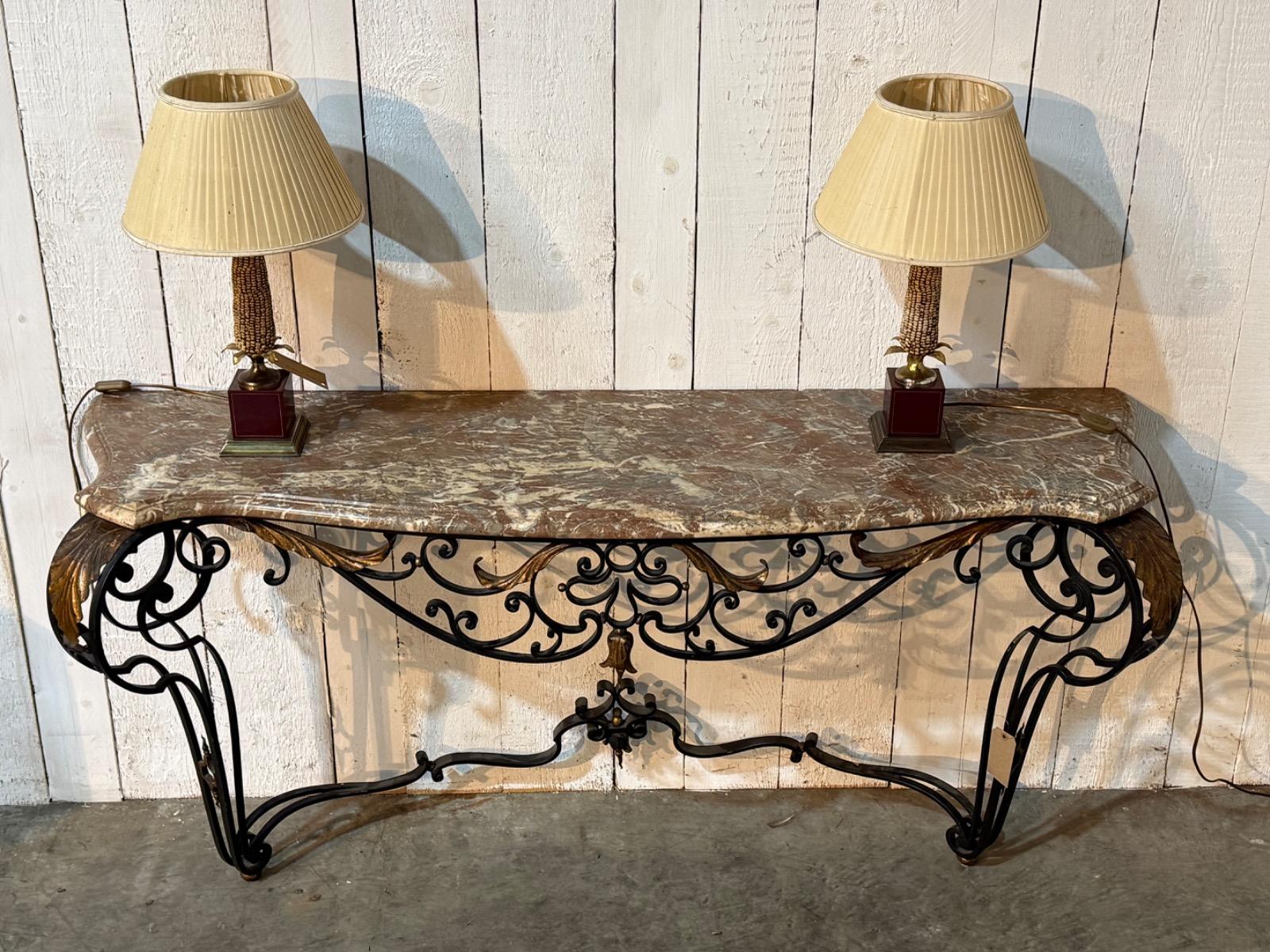 Wrought iron console with a marble top 