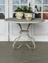 Wrought iron garden table with white marble top 